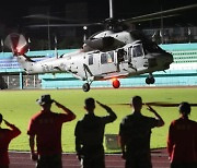 Marine completes his final mission and heads for Pohang wrapped in a Taegeukgi and saluted by fellow Marines