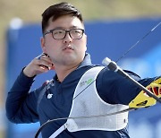 자존심 회복한 한국 양궁, 김우진 2관왕