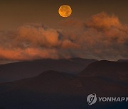 APTOPIX New Hampshire Supermoon