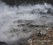 Palestinians Landfill Fire