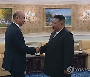 북한 김정은, 중국 정부대표단 접견