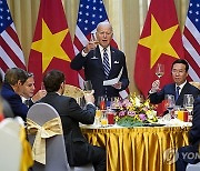 APTOPIX Vietnam Biden