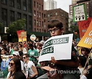 APTOPIX Climate Fossil Fuel Protest