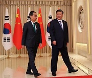 한총리 만난 시진핑 "방한 진지하게 검토하겠다"