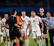 North Korean players turn on referee in tumultuous end to quarterfinal