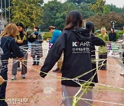 Korea National University of Arts students stand in solidarity with cafeteria cooks