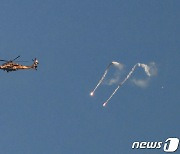 [포토] 상공에서 공격하는 이스라엘군 헬기