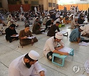 PAKISTAN PHOTO SET RELIGION STUDENTS EXAMS