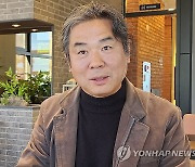 에세이 '제주를 품은 창' 펴낸 화가 김품창