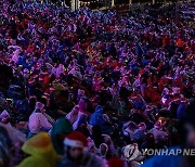 AUSTRALIA CAROLS BY CANDLELIGHT PALESTINIAN PROTEST