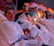 AUSTRALIA CAROLS BY CANDLELIGHT PALESTINIAN PROTEST