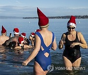 SWITZERLAND SWIM SANTA LAKE CHRISTMAS