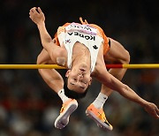 Woo Sang-hyeok falls behind Barshim for high jump silver