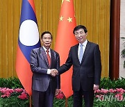 CHINA-BEIJING-WANG HUNING-LAOS-LFNC-PRESIDENT-MEETING (CN)