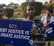 Activists Demand Debt Cancellation at G77 Summit