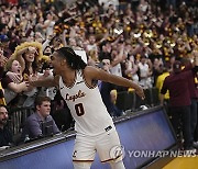 APTOPIX Dayton Loyola Chicago Basketball