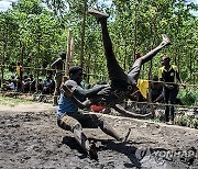 UGANDA PHOTO SET SOFT GROUND WRESTLING