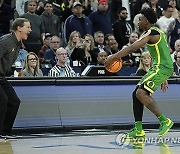 APTOPIX P12 Oregon Arizona Basketball