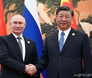"모스크바 테러 강력 규탄…러시아 노력 지지" 푸틴 위로한 시진핑