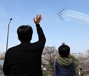 Black Eagles soar over cherry blossoms in Seoul