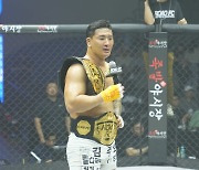 김태인, ROAD FC 초대 헤비급 챔피언 등극... 日 타이세이에 TKO 승