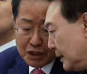洪, 대통령에 '김한길 총리·장제원 실장' 추천