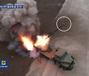 북한 ‘조종 날개’ 단 신형 240mm 방사포탄 공개…“유도기능 갖춰”