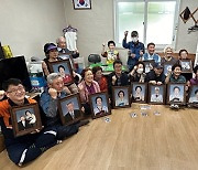 포스코사진봉사단, 중앙동 경로당 장수사진 전달식 가져