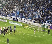 Incheon United fans throw water bottles to FC Seoul players after derby match