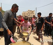 MIDEAST-GAZA-RAFAH-FOOD-RELIEF