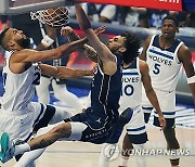 APTOPIX Timberwolves Mavericks Basketball