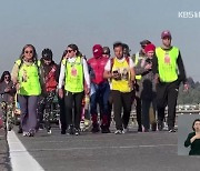 ‘엄마는 강하다’…희소병 아들 위해 천여km 강행군