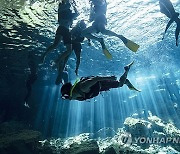 APTOPIX Mexico Train Threatened Caves