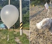 북 "오물 풍선 잠정 중단"···대북 확성기 재개 겁났나