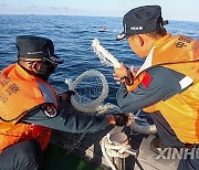 CHINA-REN'AI JIAO-PHILIPPINE NAVY PERSONNEL-ILLEGALLY GROUNDED SHIP-CHINESE FISHMEN'S NETS-DAMAGE(CN)