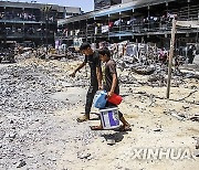 MIDEAST-GAZA-JABALIA REFUGEE CAMP-WATER