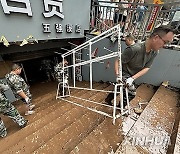 (FOCUS)CHINA-HUNAN-HEAVY RAINFALL-FLOOD-AFTERMATH (CN)