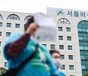 서울아산병원 교수들 “오늘부터 진료 축소”… 환자 단체는 거리로