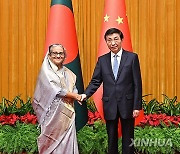 CHINA-BEIJING-WANG HUNING-BANGLADESH-PM-MEETING (CN)