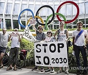 Switzerland IOC Protest France Winter Olympics