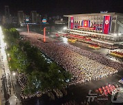 北 김정은, 한국전쟁 상징종대 행진의식 참석