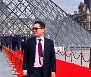 Samsung chief mixes it up with other corporate titans in Paris