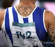 Paris Olympics Tattooed Rings Photo Gallery