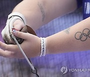 Paris Olympics Tattooed Rings Photo Gallery