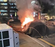 Parked Tesla EV catches fire for hours in Yongin