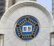 두산로보틱스-밥캣 합병에 뿔난 소액주주들, 법원에 가처분 신청