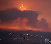 헤즈볼라 "이스라엘에 320발 로켓 발사" 보복 공격 개시(상보)