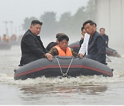 Spy agency monitoring signs of North Korea executing officials over flood damage