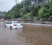 Torrential rainfall forces 1,500 to evacuate, causes widespread damage to homes, roads