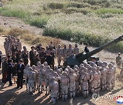 김정은, 포병학교 졸업생들 포실탄사격훈련 현지지도